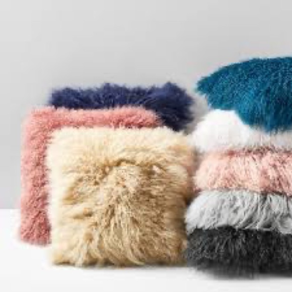 2 x West Elm team Mongolian lamb fur with pillow inserts included